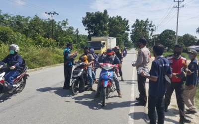 IWO Siak Bagikan Masker Gratis di Kecamatan Koto Gasib