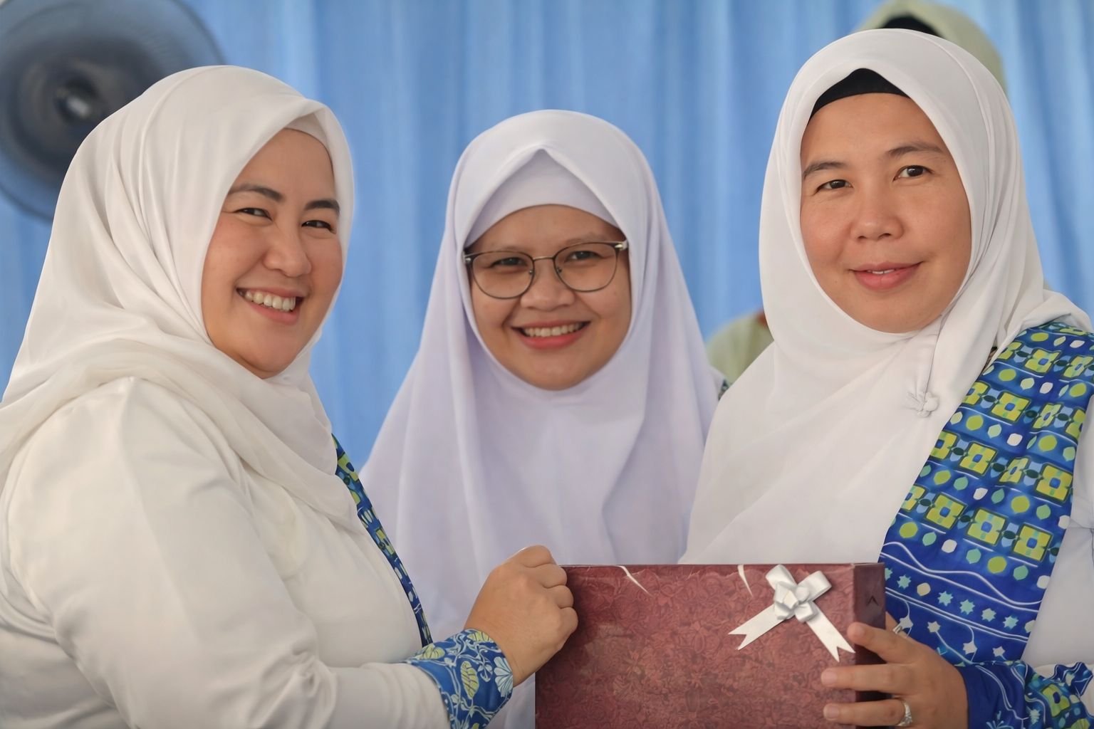 Ketua TP. PKK Rohul Salurkan 165 Paket Bantuan di Kegiatan BKMT Ujung Batu