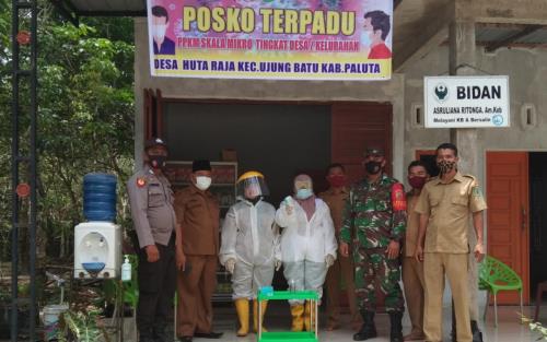 Bhabinkamtibmas Cek Posko Terpadu di Desa Huta Raja